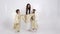 Magic video, family dressed in angel costumes, they dance on a white background