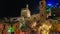 Magic view of central square of Gubbio in the night with snow and colorated lights at christmas time