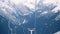 Magic view of snowfall in mountains from moving chairlift.