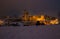 Magic view of Urbino city with snow at night in the marche region, Italy