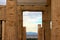 Magic view of vibrant blue sky through ancient ruins of A Propylaea Propylea or Propylaia.