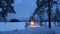 Magic vintage lantern in winter landscape. Beautiful snowy forest on background.
