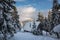 Magic winter landscape - the old wood hut, covered with snow