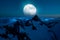 Magical Artistic Scene of Canadian Rocky Mountains with Full Moon