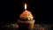 Magical birthday cupcake with a single candle, waiting to be blown out in joy