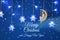 Magical christmas image of little white fairy with glitter wings sitting on the moon over blue background and silver snowflake gar