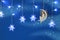 Magical christmas image of little white fairy with glitter wings sitting on the moon over blue background and silver snowflake gar