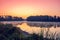 Magical dawn over the lake with a beautiful reflection on the water