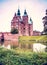 Magical fascinating landscape with famous Rosenborg Castle near pond in palace garden in Copenhagen, Denmark. Exotic amazing