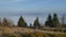 Magical inversion of clouds in the mountains, with people.