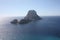 The magical island of Es Vedra with the small islet of Es Vedranell next to it in front of the coast of Cala d`Hort in the touris