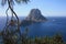 The magical island of Es Vedra with the small islet of Es Vedranell next to it in front of the coast of Cala d`Hort in the touris