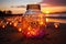 Magical jar or glass with sparkling fairy light standing on a beach at sunset, romatic peaceful evening, glowing fireflies