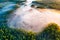 Magical morning in green forest, aerial landscape. Fog over trees