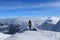 Magical panorama on peak of Chopok with view to High Tatras and Dumbier. Young skier enjoy freedom and paradise looks. Man in