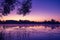 Magical pink purple sunrise over the lake