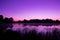 Magical purple sunrise over the lake