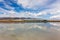 Magical sky, strange clouds on the blue sky, reflection, small train, salt lake, afternoon view of Chaka Salt Lake in Qinghai, Chi