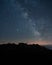 Magical starry night sky over the rocky mountains