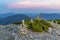 Magical summer sunset in the Carpathian mountains with over the rocky outcrops of the Gorgan region. Picturesque sunset in the mou