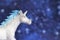 Magical unicorn on a blue background