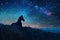 Magical unicorn gazing at sparkling night stars in beautiful blue, pink, and yellow colors