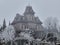 Magical view of the Phantom Manor spooky mansion during winter