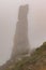 Magical view of the top of Spitz mountain in the Carpathian Mountains, Spitz mountain in the fog, mystical and scary