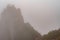 Magical view of the top of Spitz mountain in the Carpathian Mountains, Spitz mountain in the fog, mystical and scary.