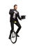 Magician riding a unicycle and performing a magic trick with a hat