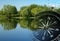 Magnetic compass over a tranquil lake