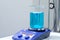 A magnetic stirrer or magnetic mixer is a laboratory device that employs a rotating magnetic field to cause a stir bar immersed in