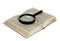 Magnification glass on a opened book.on a white background