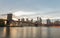 Magnificence of Brooklyn Bridge from Brooklyn Bridge Park at twilight