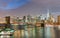 Magnificence of New York Skyline at twilight from Manhattan Bridge, USA