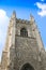 The magnificent church stands in the blue sky and white clouds.