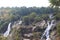 A magnificent fall view in India from the distance. Rock structure has covered most of the area around the fall