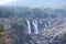 A magnificent fall view in India from the distance. Rock structure has covered most of the area around tye fall