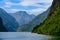 Magnificent fjord landscape with a trace from the boat