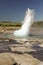 Magnificent geyser Strokkur. The geyser throws out the fountain