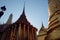 A magnificent gilded Buddhist temple with a colonnade