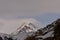 Magnificent Kazbeg mountain in Georgia, with the iconic Gergeti trinity church in Stepantsminda