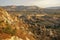 The magnificent landscape of Cappadocia at golden hour.