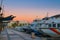 Magnificent magenta sunset color in marina harbor. End of a warm sunny day in Ibiza, St Antoni de Portmany, Spain.