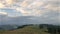 Magnificent mountain landscape at sunrise. Storm clouds in the sky.