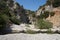 Magnificent mountainous landscape in the vicinity of the parched riverbed of the Loutani river. Kolympia, Rhodes, Greece