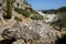 Magnificent mountainous landscape in the vicinity of the parched riverbed of the Loutani river. Kolympia, Rhodes, Greece