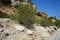 Magnificent mountainous landscape in the vicinity of the parched riverbed of the Loutani river. Kolympia, Rhodes, Greece