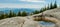 Magnificent panoramic view the coniferous forest on the mighty Carpathians Mountains and beautiful blue sky background. Beauty of