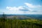 Magnificent panoramic view of the forest and beautiful blue sky.